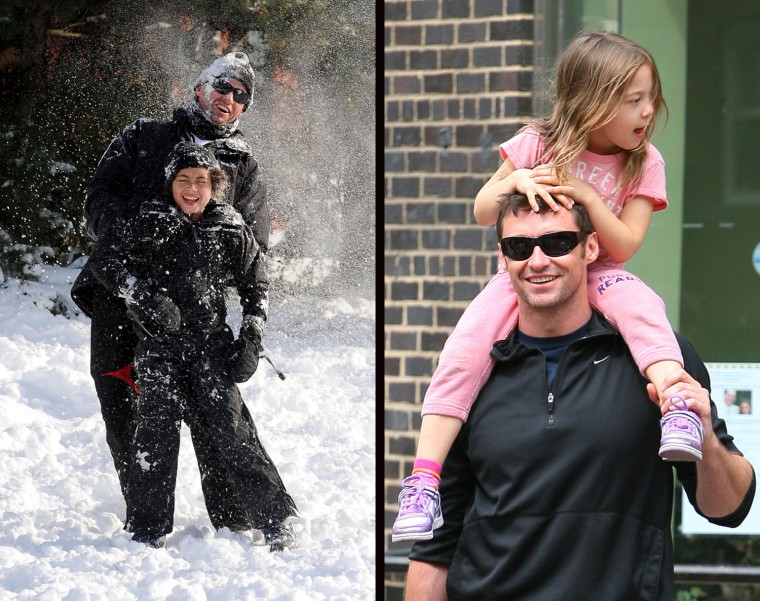 Hugh Jackman and his son Oscar take to their local park to have a snowball fight after a recent storm

Ava Jackman hitches a ride on Hugh Jackman's shoulders after spending some time at a local playground in NYC