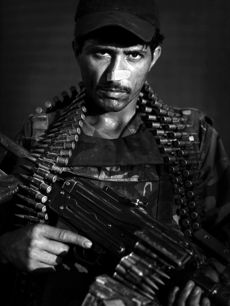 Image: Afghan National Army soldier Mirza Mirzali, a Pashtun from Jalalabad, eastern Afghanistan