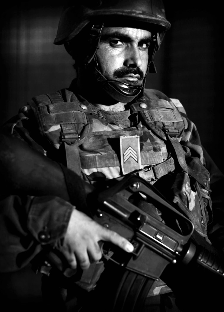 Image: Afghan National Army soldier Lt. Dilah Ga, an ethnic Tajik from Tahar, northern Afghanistan