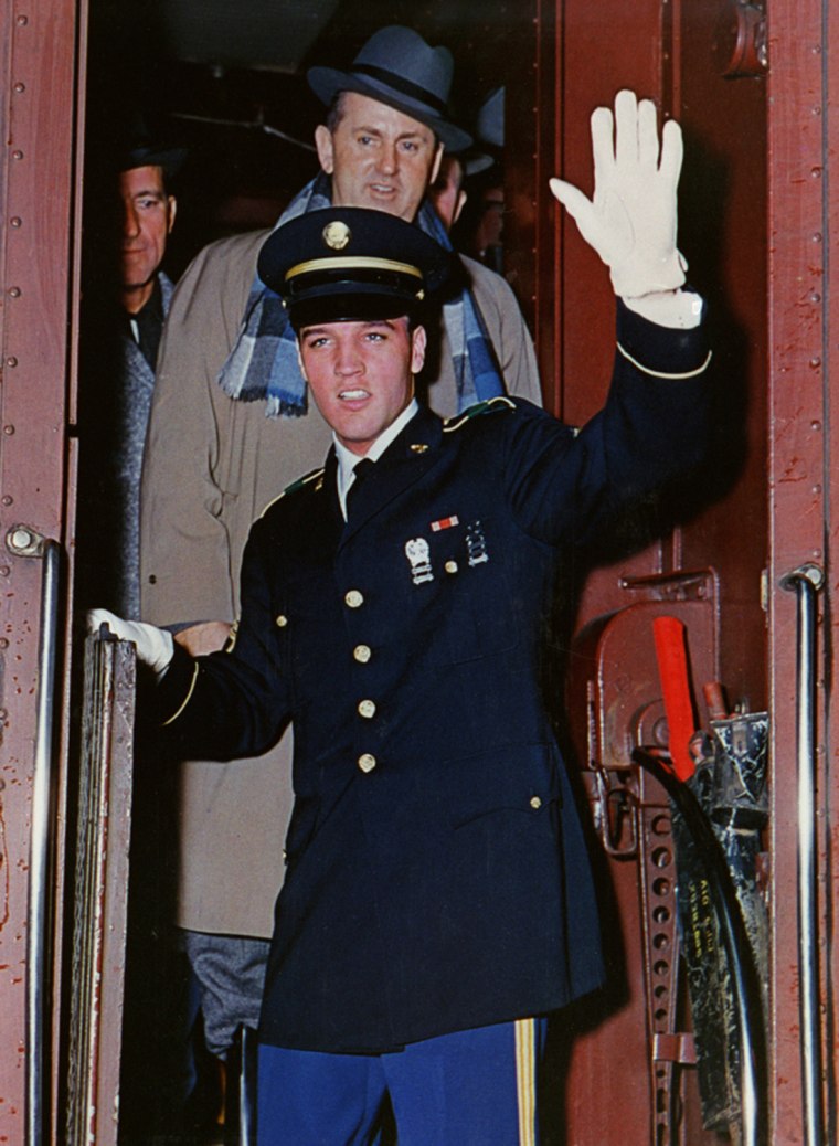 Some 200 fans waited at Union Station to welcome  Elvis Presley home from his stint in the U.S. Army Monday March 7, 1960.  He was wearing a (non-issue) dress blue Army uniform made in Germany. Elvis was discharged at the rank of sergeant, but the tailor had mistakenly given him the stripes of staff sergeant. The formal white shirt was a gift from Frank Sinatra delivered by his daughter, Nancy,  Thursday (March 3) on Elvis' first day back in the U.S. On March 26th, Elvis would tape a special \"Welcome Home, Elvis\" version of Sinatra's ABC-TV variety show which aired May 12th. Asked by reporters if he planned to wiggle his hips when he returned to singing, Elvis said: \"I'm gonna sing and I'll let the shaking come naturally. If I had to stand still and sing, I'd be lost. I can't get any feeling that way.\"  (By Charles Nicholas / The Commercial Appeal)