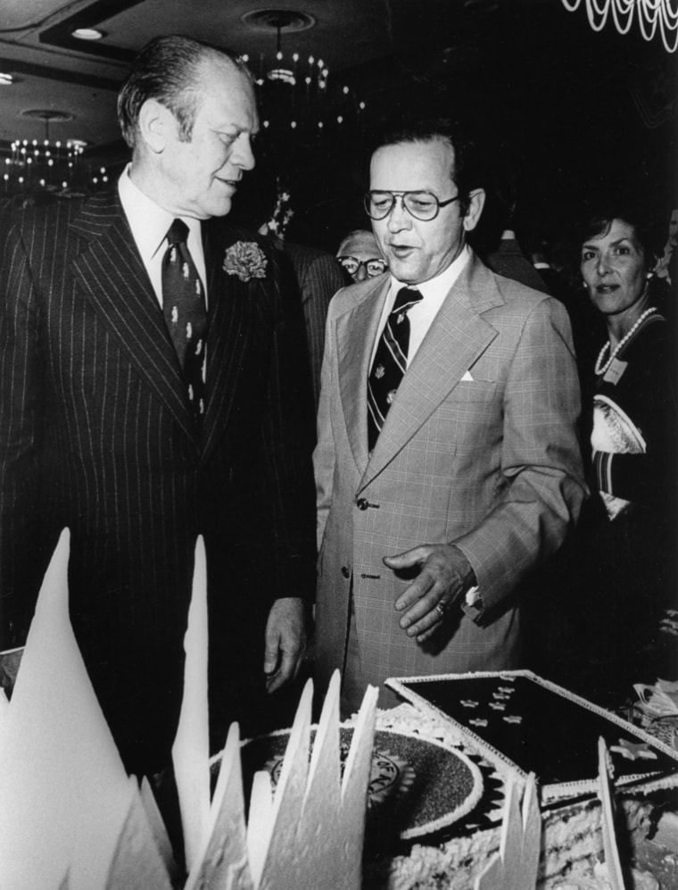 Image: President Gerald Ford stands beside Ted Stevens at Stevens' 50th birthday in Anchorage, Alaska, 1973