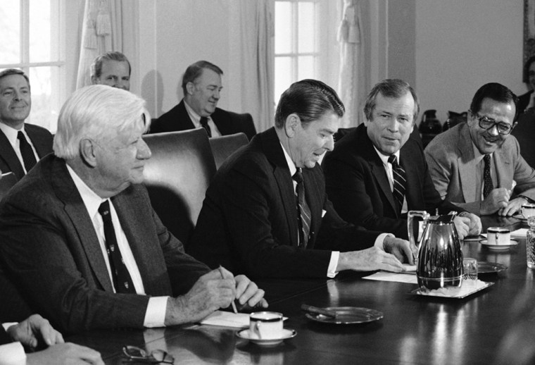 Image: President Ronald Reagan is flanked by Congressional leaders during a meeting in the Cabinet Room of the White House in Washington, 1984