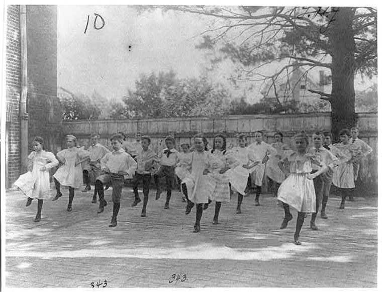School children learning a dance in a school yard, Washington, D.C.Johnston, Frances Benjamin, 1864-1952, photographer 
1899?