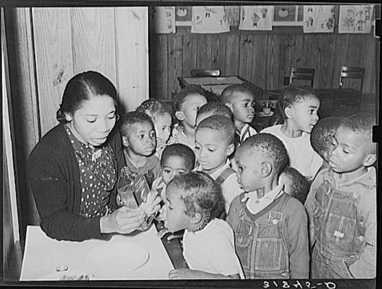 Children in nursery school getting cod liver oil. Lakeview Project, Arkansas
Lee, Russell, 1903-1986, photographer 
1938 Dec.