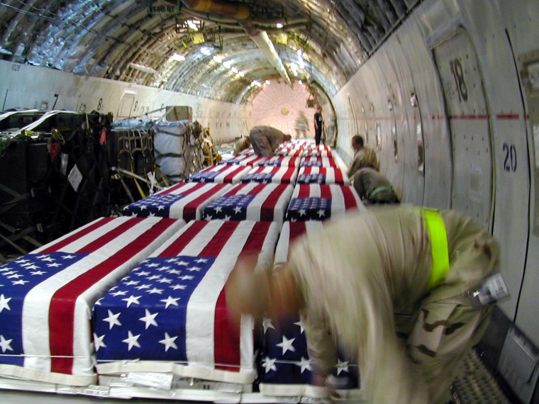 21 Flag Draped Coffins Returned to United States