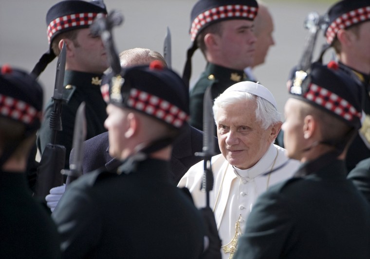 Image: Pope Benedict XVI inspects a guard of honour at Edinburgh Airport in Scotland