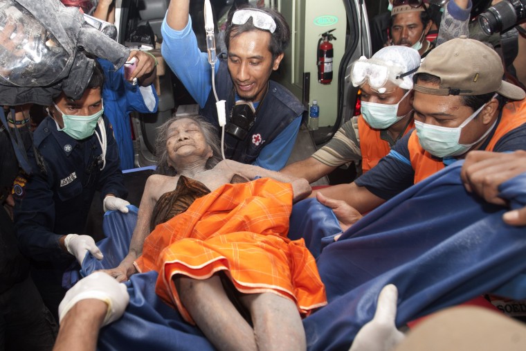 Image: An elderly woman with injuries sustained from Mount Merapi's latest eruption arrives at Sarjito hospital in Yogyakarta