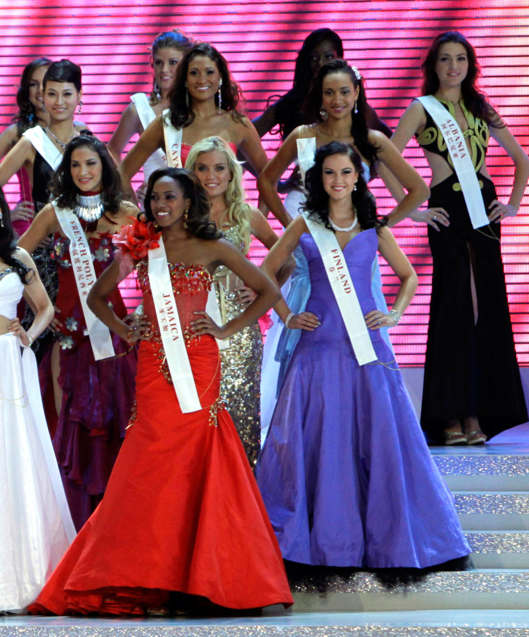 Image: Miss Finland Anne Nurminen and other contestants take part in the 60th Miss World pageant in Sanya