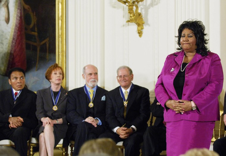Singer Aretha Franklin closes her eyes a
