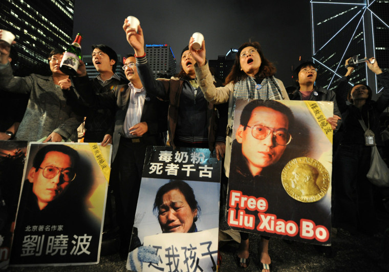Image: Protestors toast Nobel prize winner Liu