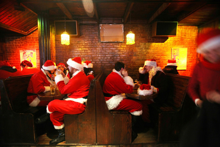 Image: Holiday Revelers Hit New York City Streets Dressed As Santas