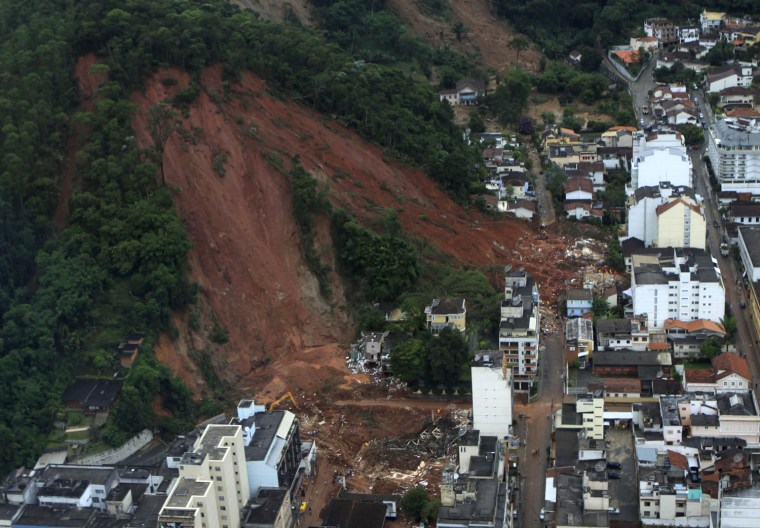 Image: An aerial view of a neighborhood partially destroyed by a landslide caused by heavy rains in Nova Friburgo