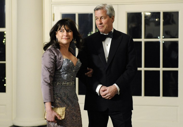 Image: Dimon and his wife arrive for the state dinner hosted by U.S. President Barack Obama and first lady Michelle Obama for President of China Hu Jintao at the White House in Washington