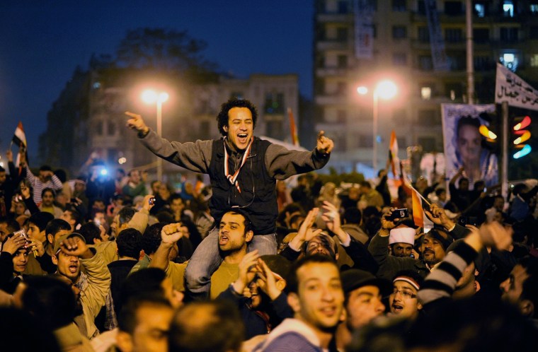 Image: Anti-government protesters celebrate inside Tahrir Square after the announcement of Egyptian President Hosni Mubarak's resignation in Cairo
