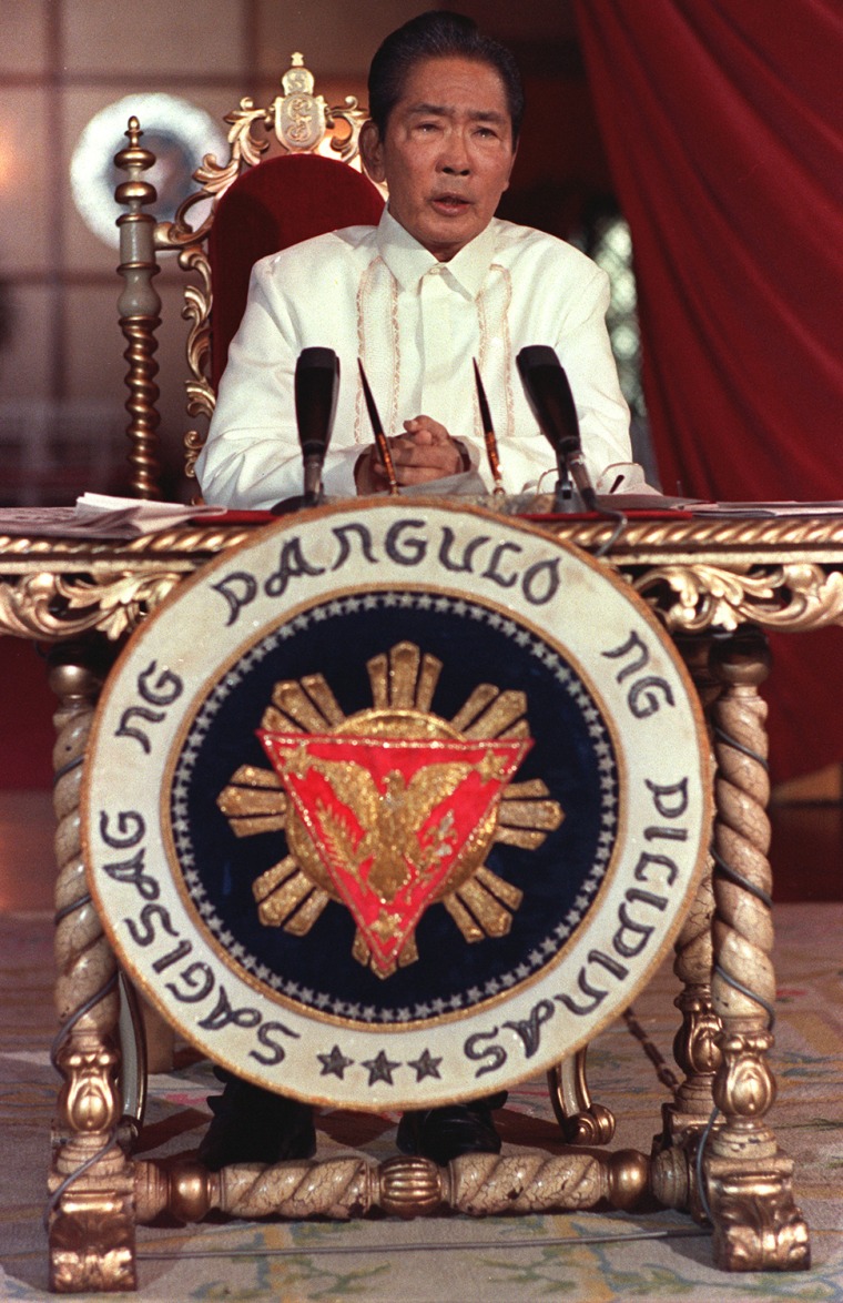 President Ferdinand Marcos holds a press