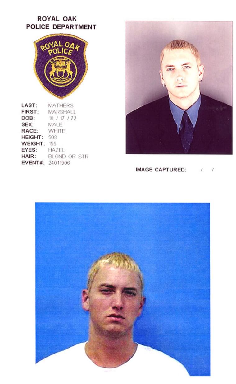 Marshall Mathers, III (aka Eminem) was arrested twice in June 2000 on gun charges in Michigan, and was hit with probationary sentences in both cases, one in Royal Oak, the other in Warren (above you'll find mug shots from both those arrests). The rapper was nabbed by Warren cops for carrying a concealed weapon and assault after fighting with a man he saw kissing his estranged wife Kim outside of a club. He also got popped for brandishing a weapon during a parking lot beef with members of the rival rap outfit Insane Clown Posse.
