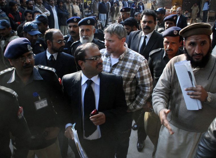 Image: Raymond Davis is escorted by police in Pakistan