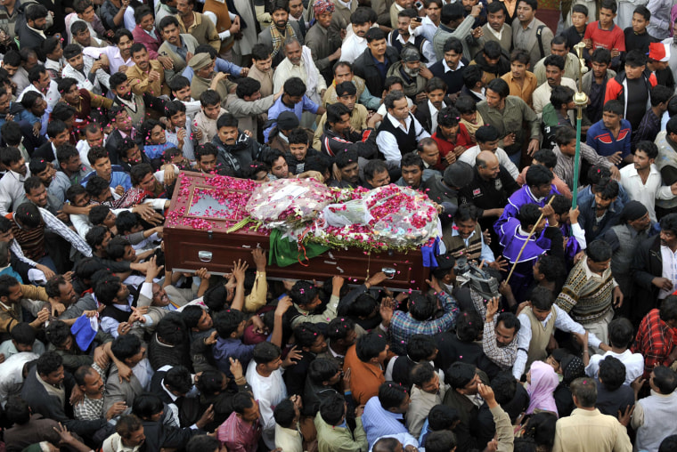 Image: Pakistani Christians carry the coffin of