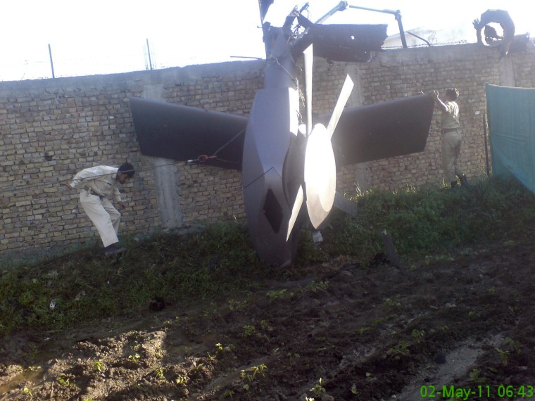 Image: A damaged helicopter at the compound of Osama bin Laden in Abbottabad