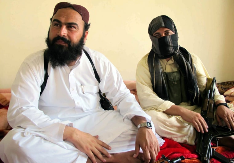 Image: Taliban militants link release of Swiss couple with Pakistani woman Aafia by US