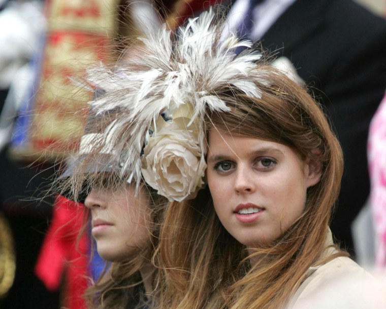 Princess Eugenie, left, and Princess Beatrice leave St George's Chapel in Windsor, England, after the annual Garter Service, Monday June 19, 2006.  The Princess's father Prince Andrew,  and the Prince Edward were formally made Knights of the Garter. The Order of the Garter, established by Edward III in 1348, is the Queen's personal gift, without advice from government ministers. (AP Photo / Tim Ockenden, PA, Pool)