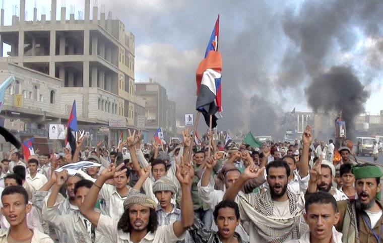 Image: Protesters march during an anti-government demonstration in Radfan, a district in the southern Yemeni province of Lahej