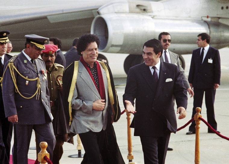 Image: File photo of Tunisian President Zine Al-Abdine Ben Ali welcoming Libyan leader Muammar Gaddafi upon his arrival at Tunis airport