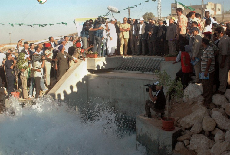 Image: Water gushs as the son of Libyan leader