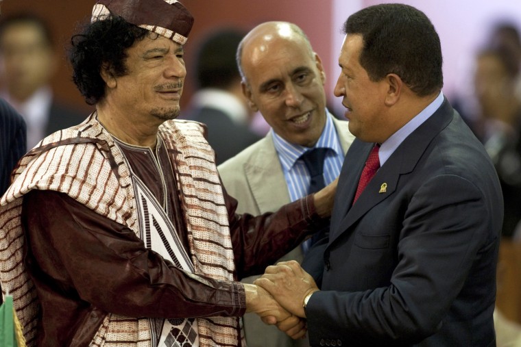 Image: Muammar Gaddafi greets Hugo Chavez
