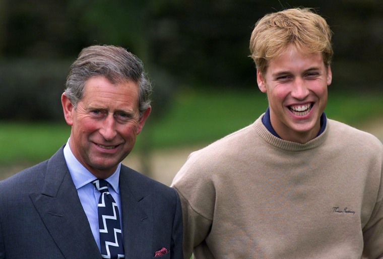 Prince William (R) and his father Prince