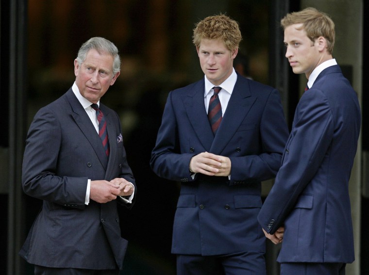 Britain's Prince Charles (L) and his two
