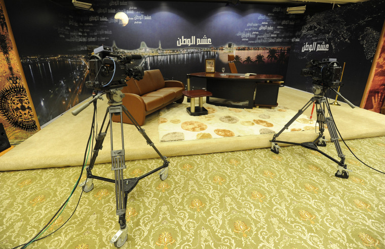 Image: The Libyan state television set is seen abandoned at the Rixos hotel in Tripoli