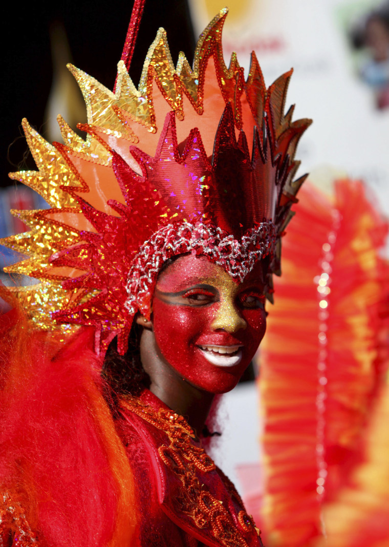Image: A girl participates in the Red Cross Children's Carnival competition at Queen's Park Savannah in Port of Spain