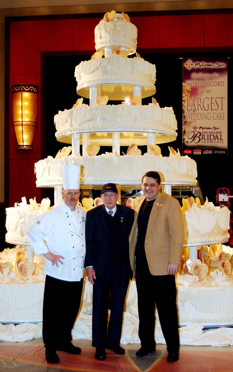 Largest Wedding Cake: Chef Lynn Mansel of the Mohegan Sun Casino Connecticut whipped up this seven-tiered, 15,032-pound cake in 2004, nearly tripling the record for the world's heaviest wedding cake. The recipe called for 10,000 pounds of pound cake batter and 4,810 pounds of creamy frosting. It could feed 59,000 people.