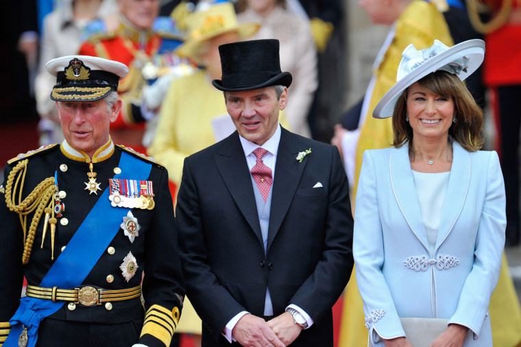 Image: Britain's Prince Charles, Michael and Carole Middleton are seen at  in Westminster Abbey, in central London