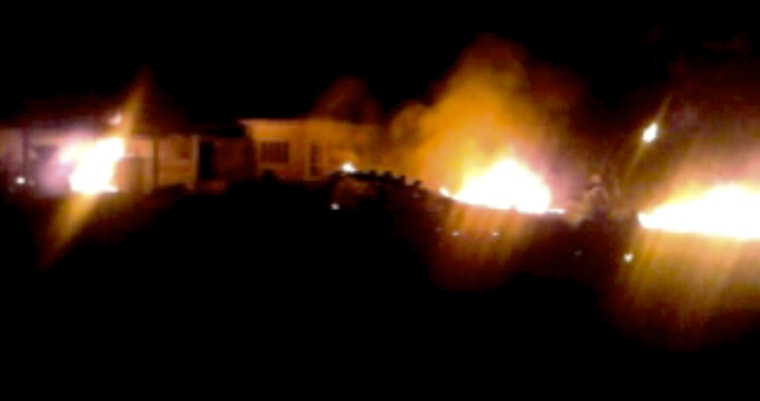Image: Frame grab shows compound, within which Osama bin Laden was killed, in flames after it was attacked in Abbottabad