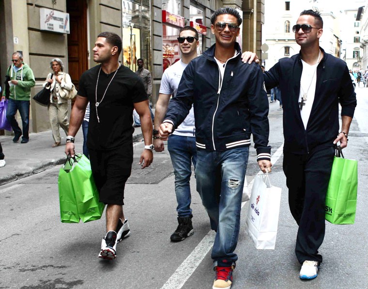 Cast members, from left, Ronnie Ortiz-Magro, Vinny Guadagnino, Paul \"Pauly D\" DelVecchio and Mike \"The Situation\" Sorrentino shop in Italy.