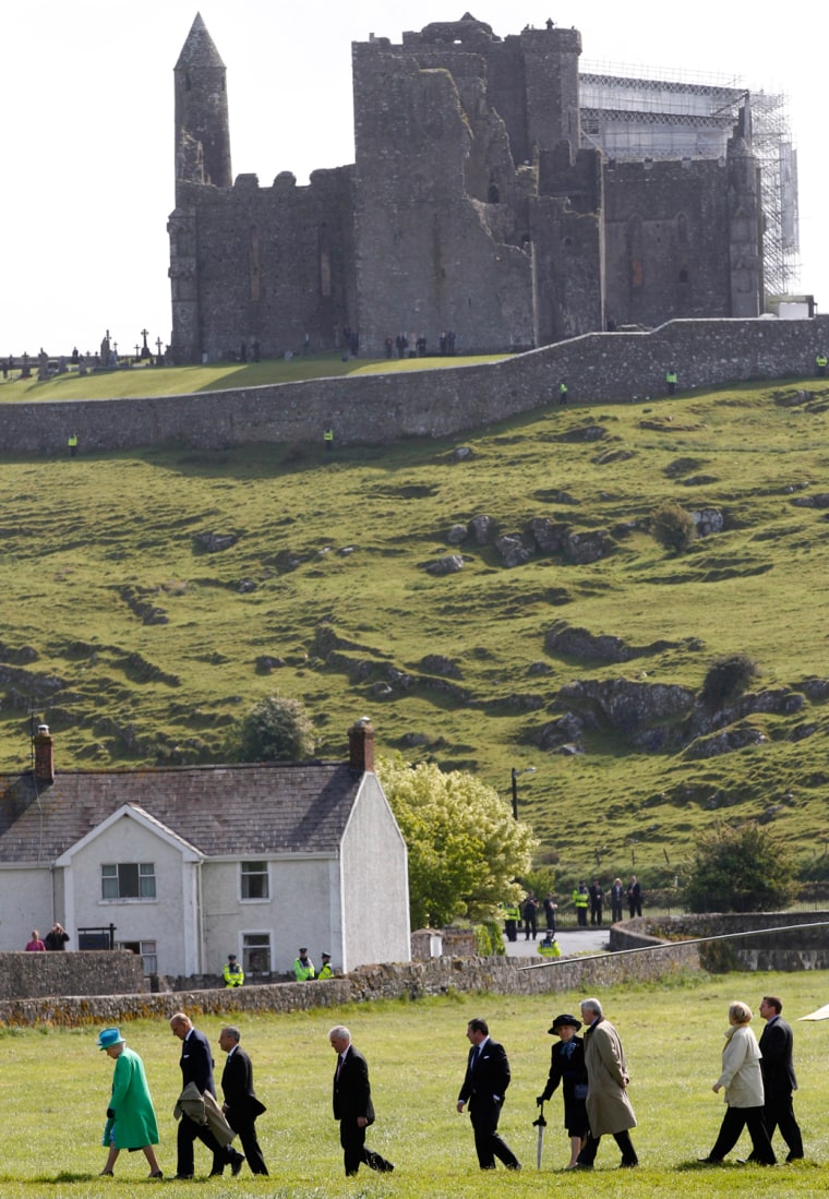 Image: Britain's Queen Elizabeth and Prince Philip arrive at St Patrick's Rock in Cashel