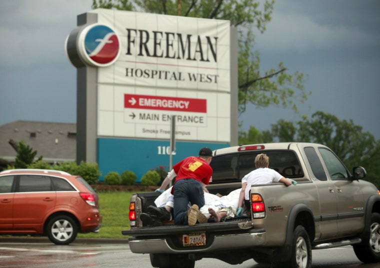 Image: Truck carries injured to Freeman Hospital West