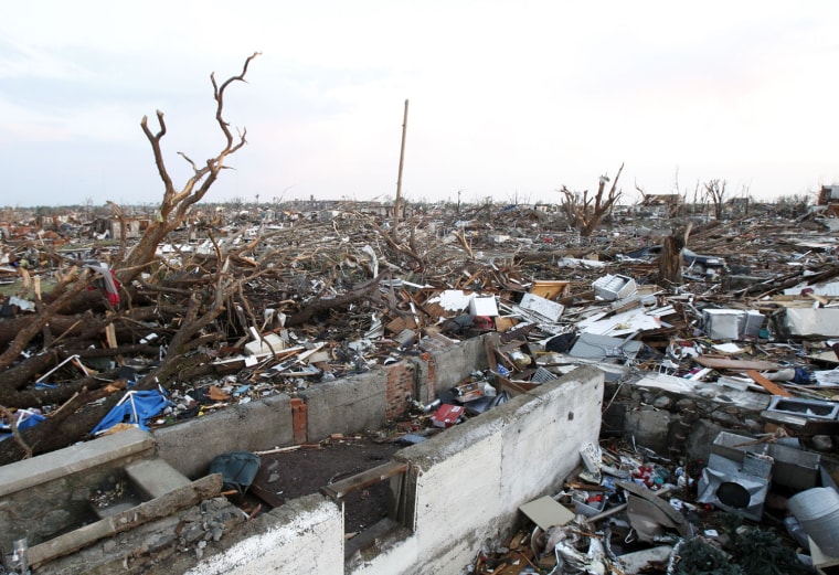 Image: Blocks of homes lie in total destruction after a tornado hit Joplin