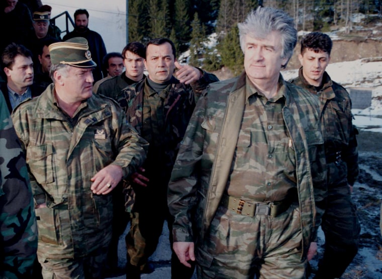 Image: Bosnian Serb wartime leader, Radovan Karadzic, second right, and his general Ratko Mladic, first left, in 1995.