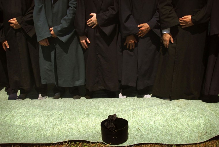 BOSNIAN MUSLIM CLERICS PRAY DURING SREBRENICA MASSACRE ANNIVERSARY.
