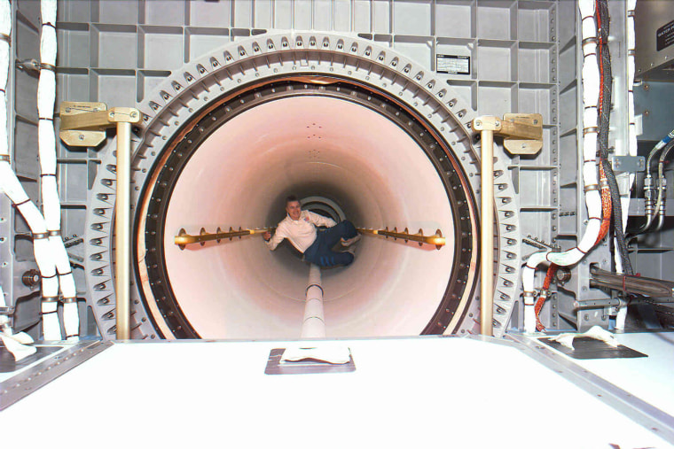 383927 10: FILE PHOTO: Astronaut Shannon W. Lucid floats through the tunnel that connects Spacehab to Atlantis'' cabin, September 24, 1996. Mir is nearing the end of its existence as Russia plans to steer the craft out of orbit in late February 2001 in a controlled crash to dump the space station safely into the Pacific Ocean. (Photo by NASA/Newsmakers)