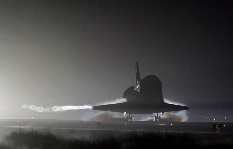 The space US Shuttle Atlantis lands earl