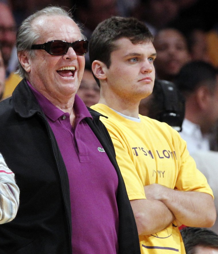 Image: Actor Nicholson and his son Raymond watch Los Angeles Lakers play Dallas Mavericks in Los Angeles