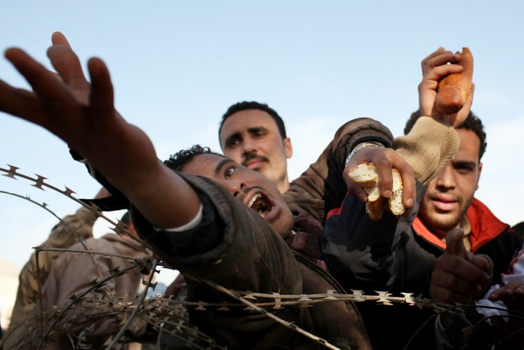 Image: people fleeing Libya