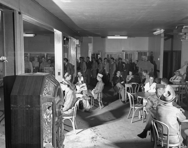 Workers eat at a cafeteria in Los Alamos