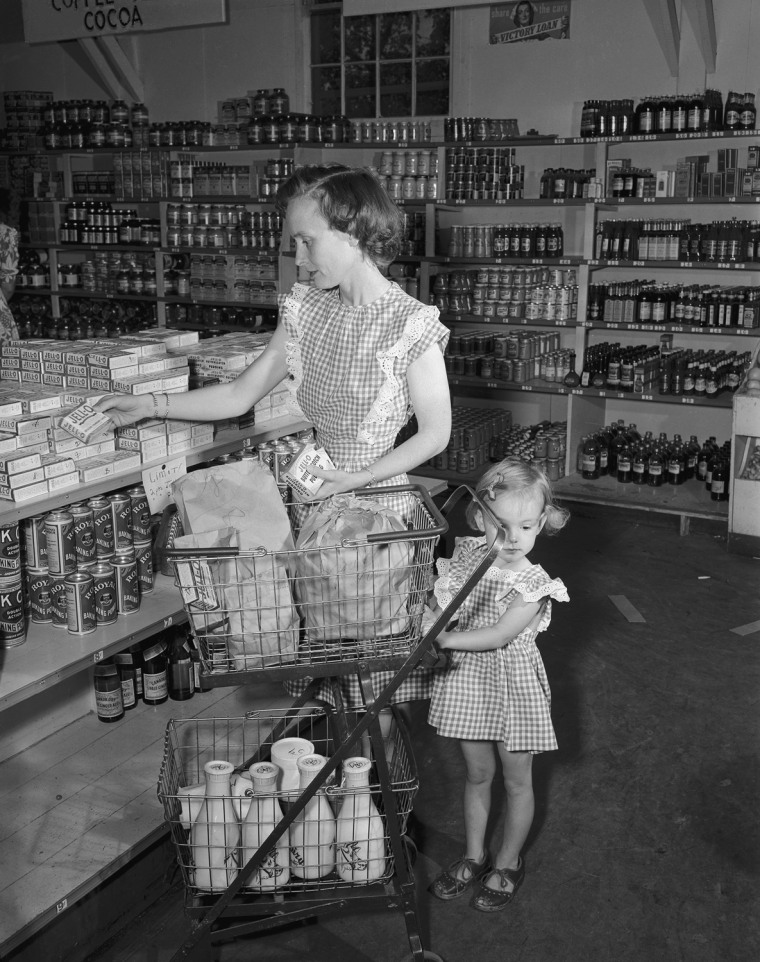a woman and her daughter shop at a los alamos grocery store