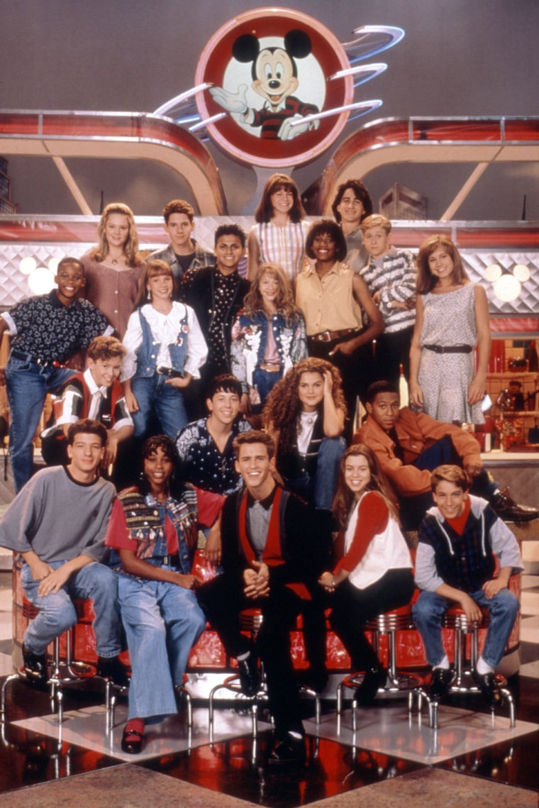 MICKEY MOUSE CLUB, Britney Spears (in blue vest), Christina Aguilera (next to
 Britney), Keri Russell (in
 front of Christina), J. C.
 Chasez of ''N Sync (left 
front), Justin Timberlake (behind J.C.), 1989-94