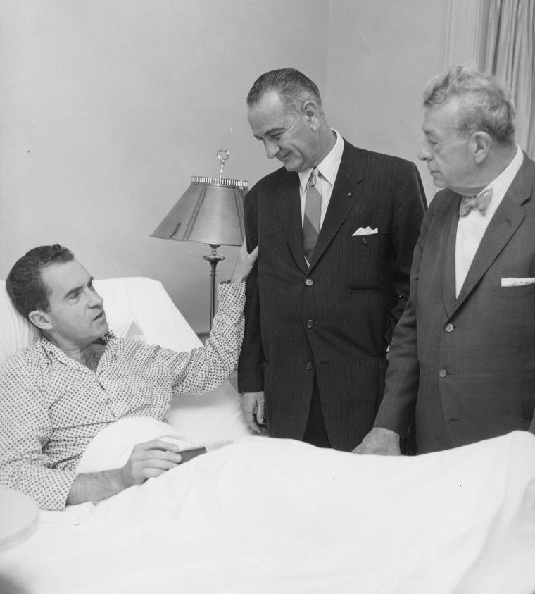 FILE - In this August 1960 file photo provided by Walter Reed Army Medical Center, Presidential candidate Richard M. Nixon is visited at Walter Reed Army Medical Center by Vice Presidential candidate Sen. Lyndon Johnson, Senator John Kennedy's running mate, and Senator Everett Dirksen.  Nixon spent two weeks at Walter Reed recovering from a bacterial staph infection.  (AP Photo/Walter Reed Army Medical Center, ho)